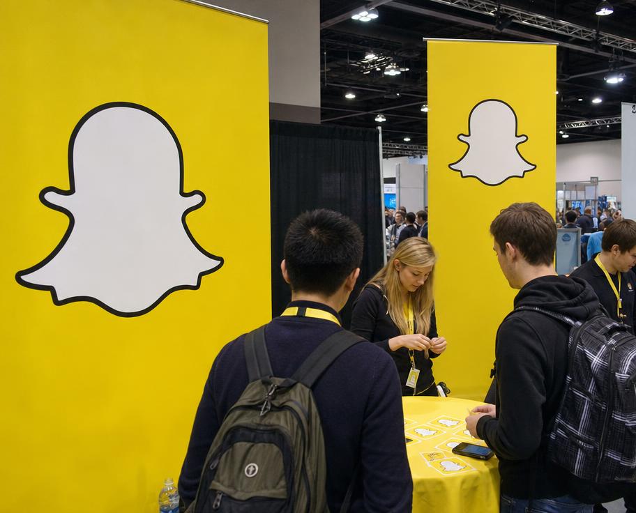 Ghostface Chillah artwork displayed at a Snap Inc. event booth